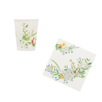 Set di bicchiere e tovagliolo di carta bianchi con fantasia floreale